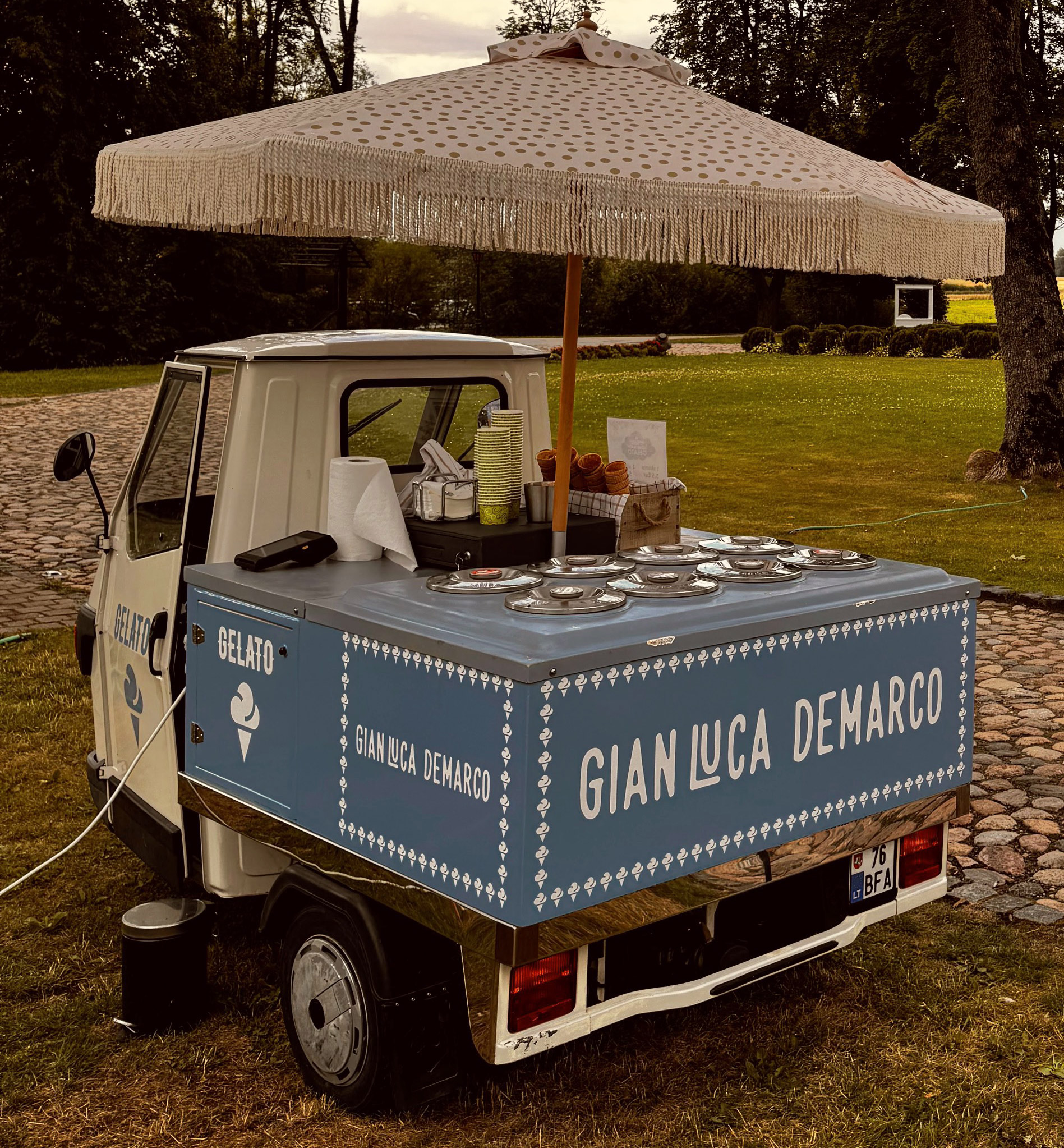 Piaggio Ape 50 Eiswagen rear view showing freezer compartment and branding